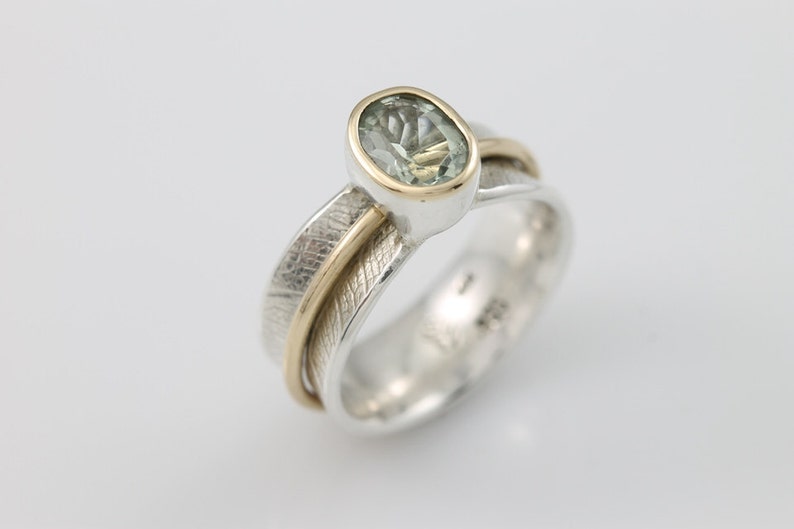 Stone Set Bodhi Leaf Spinner Ring